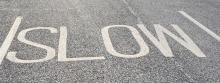 Slow road marking