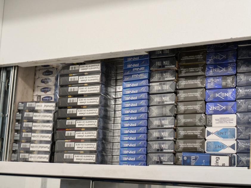 Cigarettes stashed in a hideaway within a shop