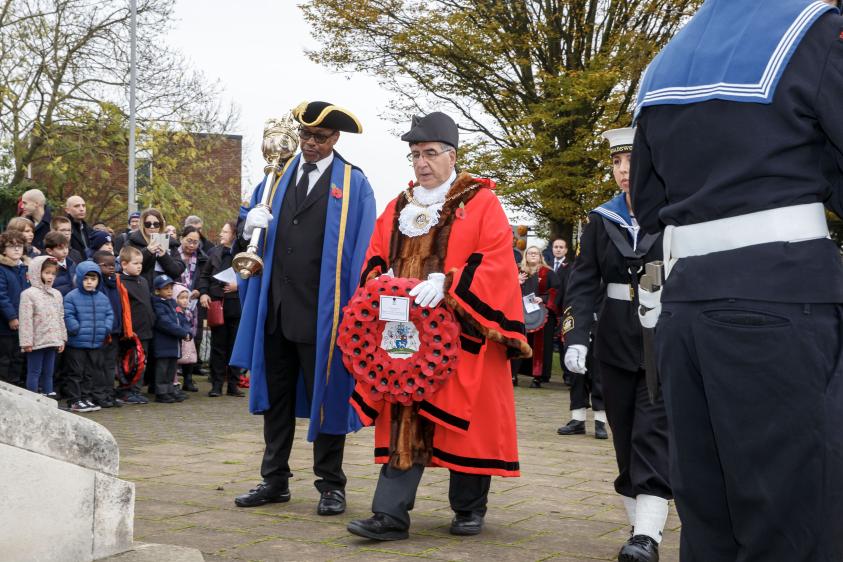 The Worshipful Mayor of Barnet, Cllr Tony Vourou, lays a wreath at Hendon War Memorial