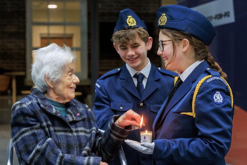 JLGB young leaders Becca Silverstone and Sam Rose-Isaacs and Holocaust survivor Vera Schaufeld MBE lit the memorial candle at this years service.